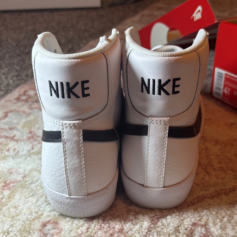 Nike White High-Top Sneakers with Black Swoosh - Picture 2 of 4